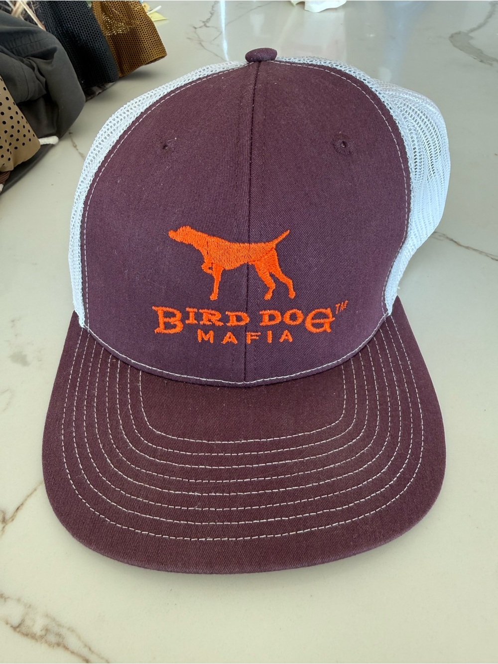 Bird Dog Mafia Trucker Hat - Maroon with Orange Logo